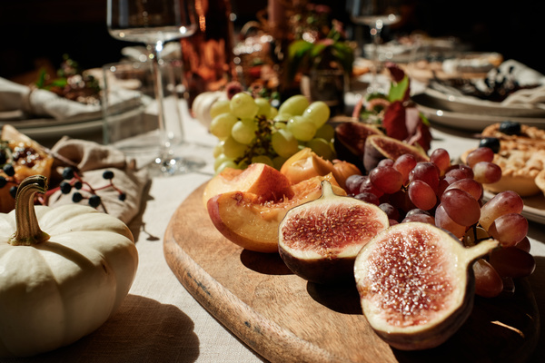 Figs and Grapes and Peach on Table